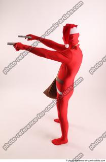 JOEL_ADAMSON CHRISTMAS VILLAIN WITH TWO GUNS